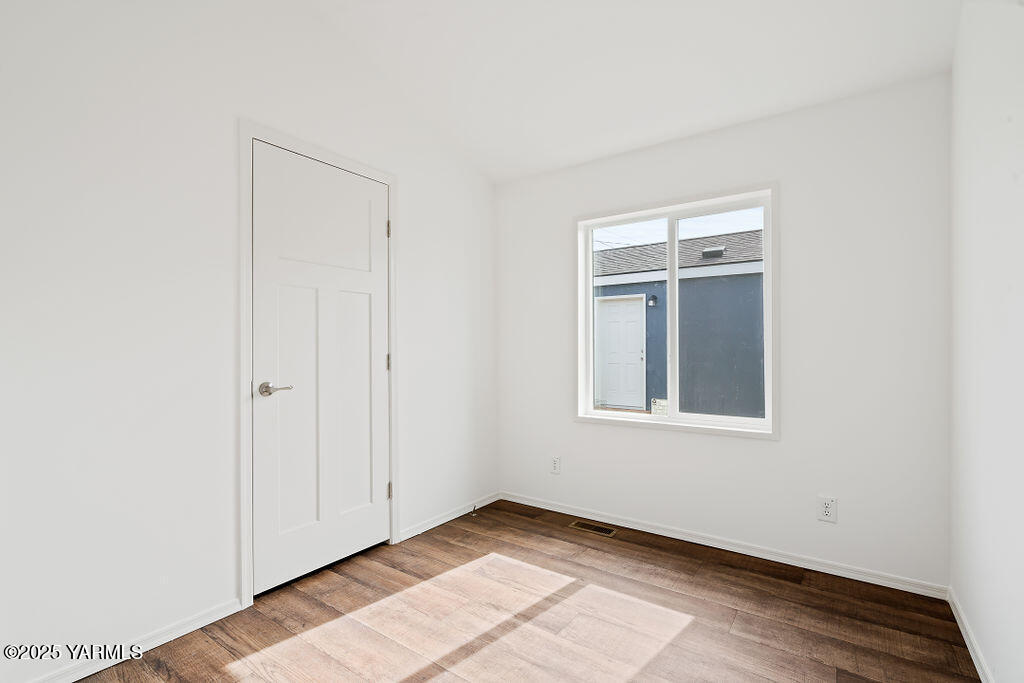1418 Hathaway Street, Unit 24A Yakima, WA 98902 - Photo 11 of 12 a view of an empty room and window