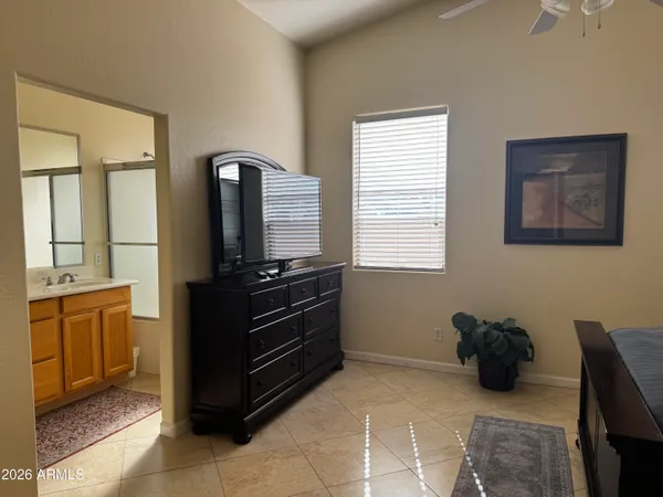 a kitchen with a refrigerator and a stove