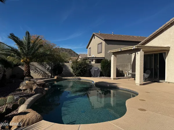 a view of a house with roof deck