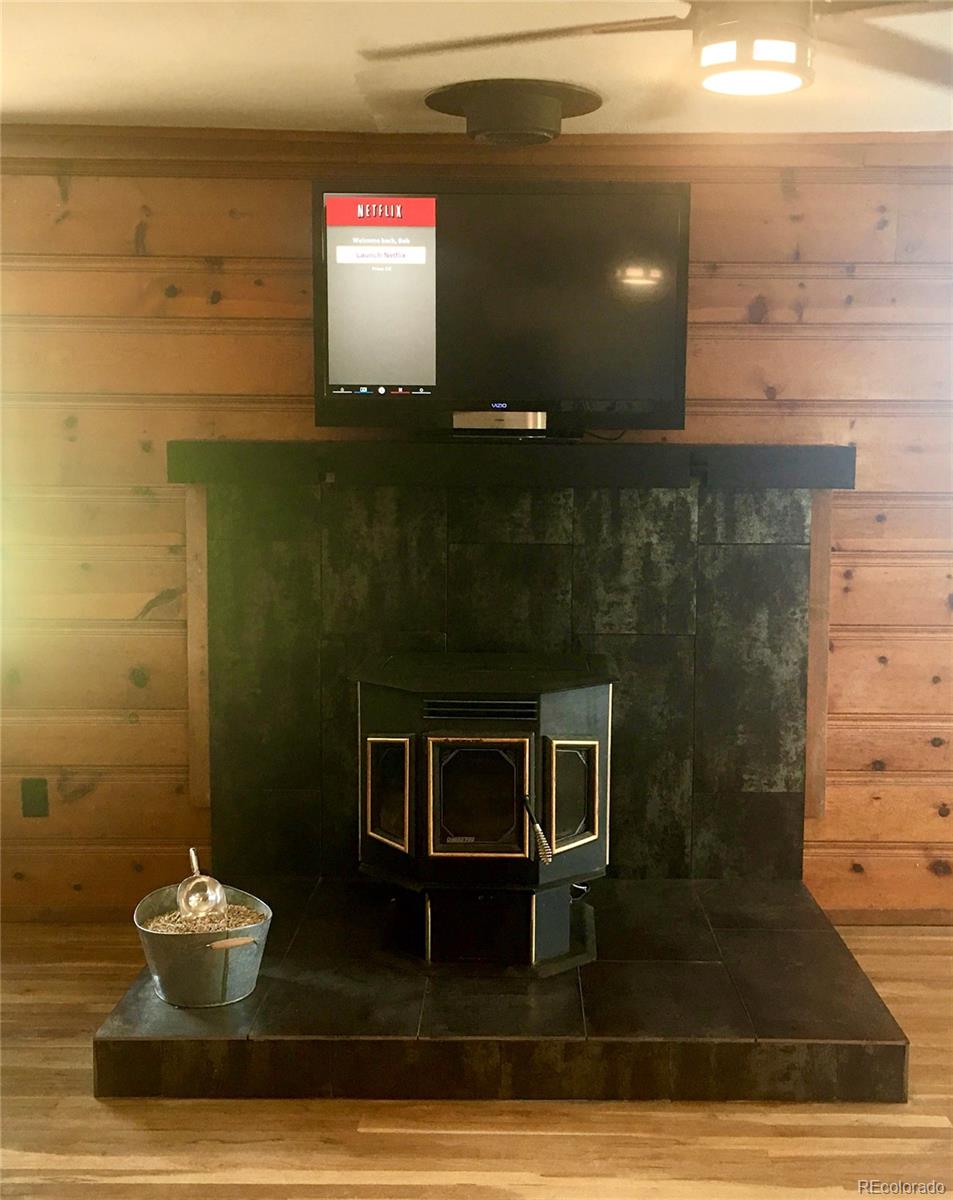 34200 Sioux Trail Pine, CO 80470 - Photo 30 of 37 a bathroom with a sink and a mirror