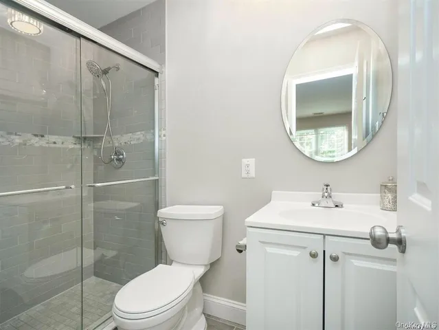 a view of entryway with wooden floor and stair