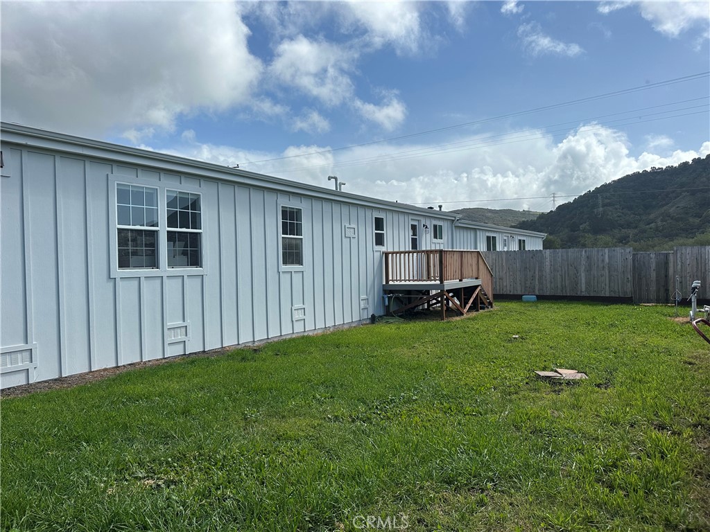 1970 Quintana Road Morro Bay, CA 93442 - Photo 17 of 38 a view of backyard with barbeque grill and wooden fence