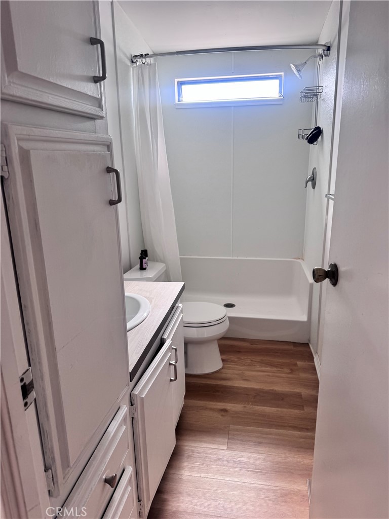 1970 Quintana Road Morro Bay, CA 93442 - Photo 21 of 38 a bathroom with a sink a toilet and shower