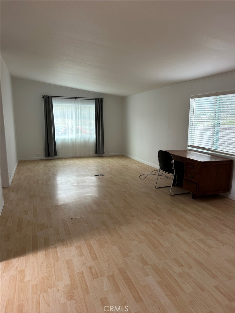 1970 Quintana Road Morro Bay, CA 93442 - Photo 31 of 38 a view of an empty room with window and wooden floor