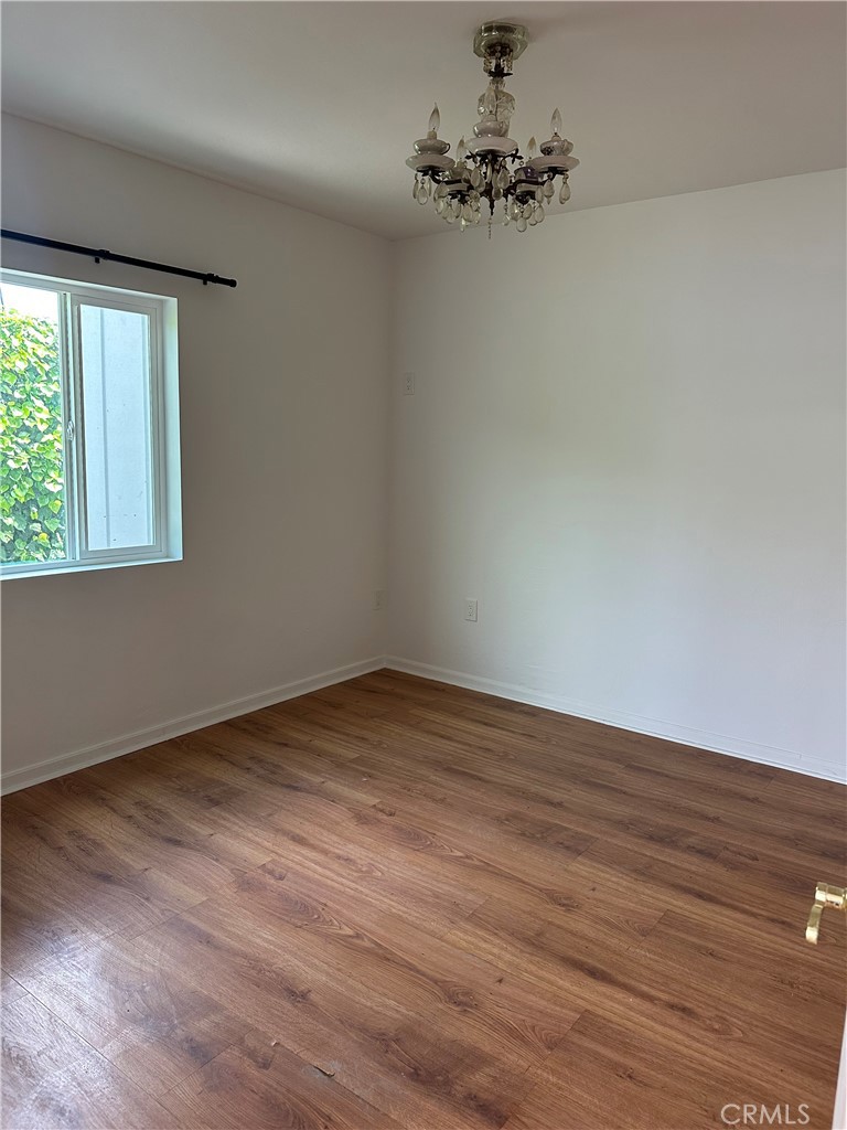 1970 Quintana Road Morro Bay, CA 93442 - Photo 7 of 38 a view of empty room with wooden floor and fan