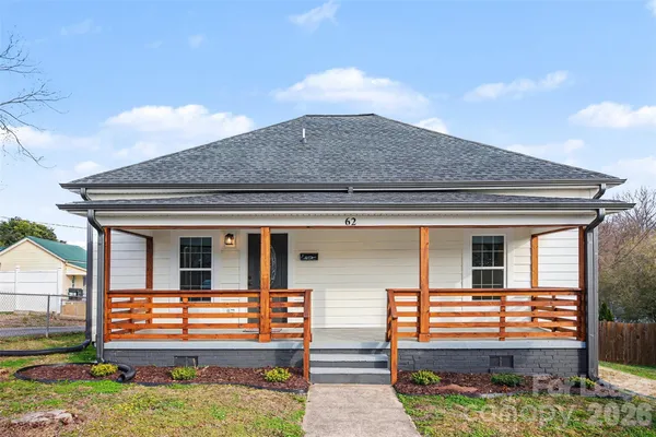 a front view of a house with porch