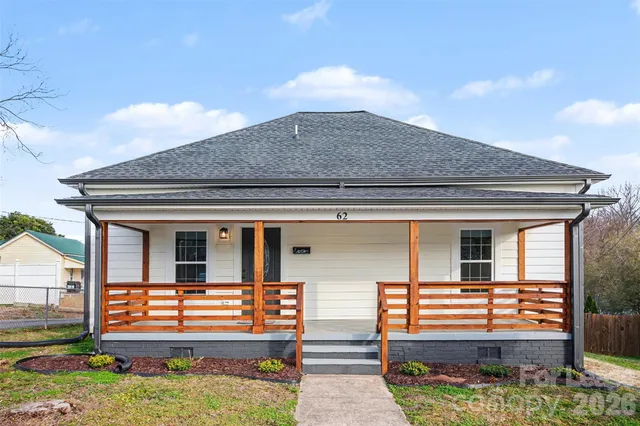 a front view of a house with porch