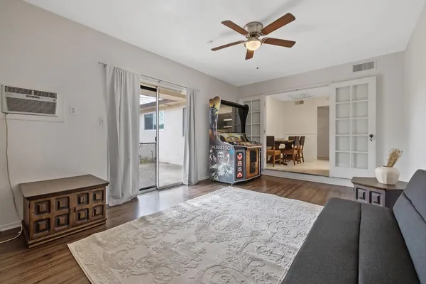 a bedroom with a bed and a desk