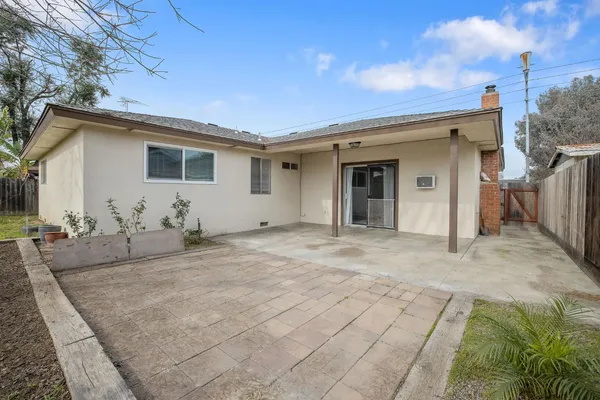 a view of a house with a patio