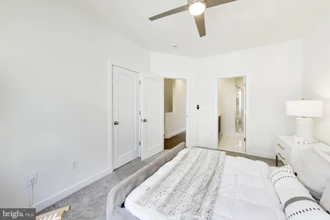 a bathroom with a double vanity sink mirror and double