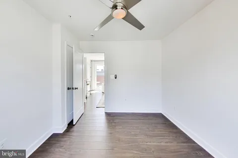 a picture of a bathroom with a shower