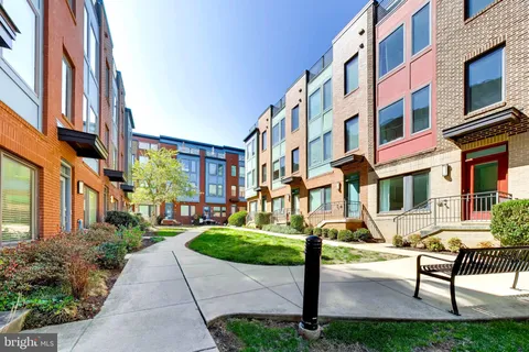 a view of an empty room and a window