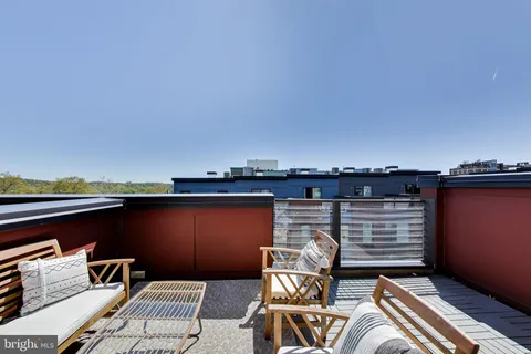 a picture of a bench in a white building