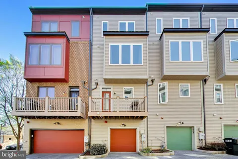a park view with a bench and trees