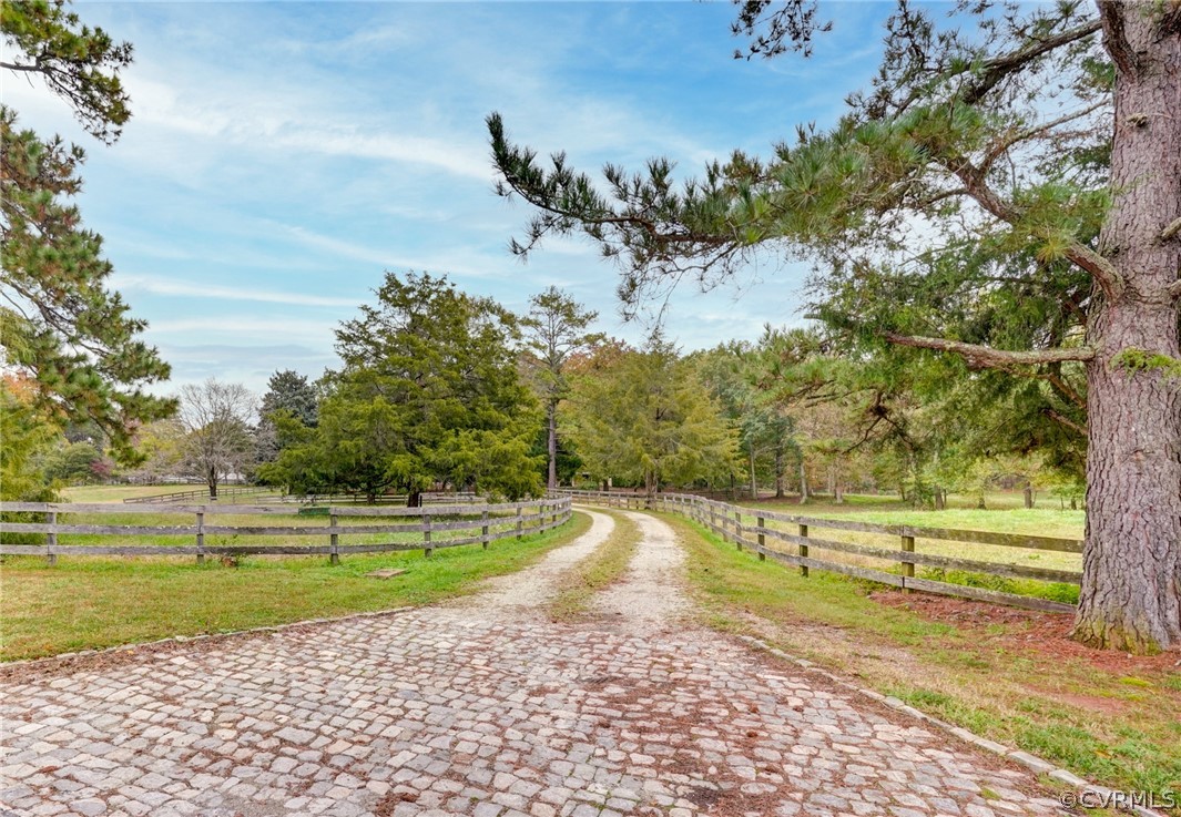 1101 Dover Road Manakin-Sabot, VA 23103 - Photo 3 of 50 a view of a yard with a large trees