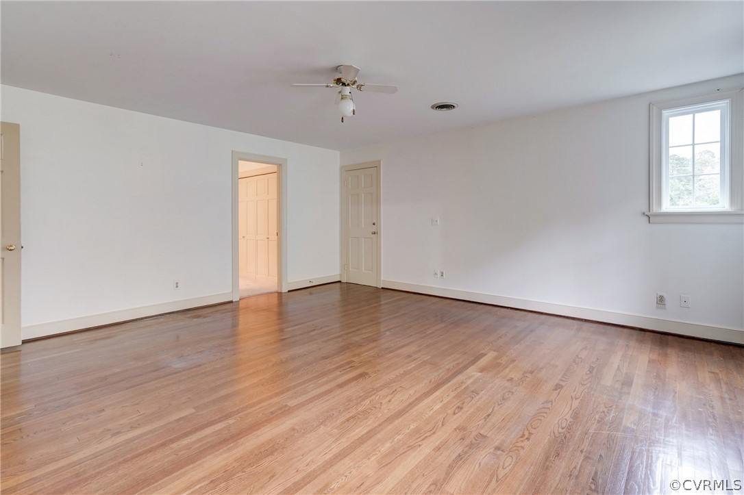 1101 Dover Road Manakin-Sabot, VA 23103 - Photo 39 of 50 a view of an empty room with wooden floor and a window