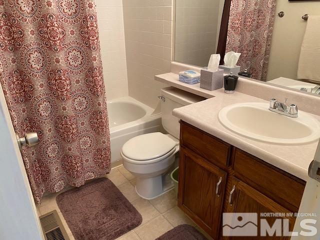 1316 Valley Creek Road Reno, NV 89523 - Photo 8 of 12 a bathroom with a toilet sink and mirror
