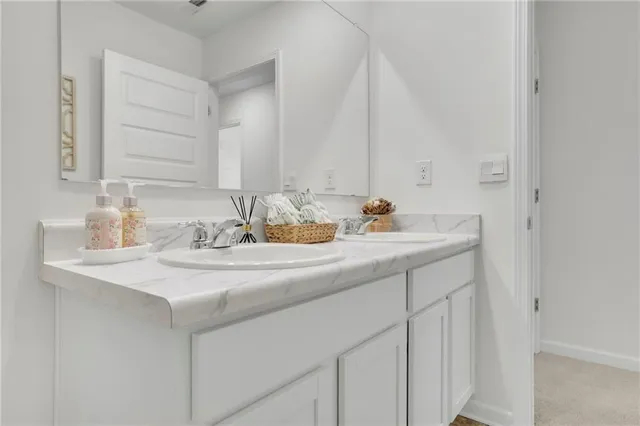 a view of living room filled with furniture and wooden floor