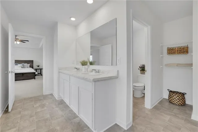 a bathroom with a bathtub and shower