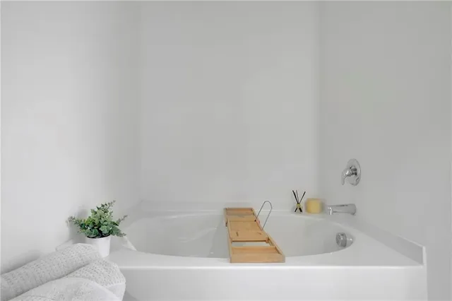 a view of a chair and table in patio of the house