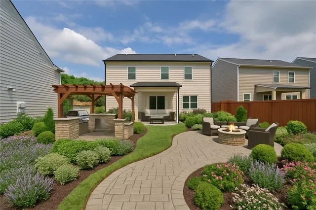 an aerial view of a house with a swimming pool