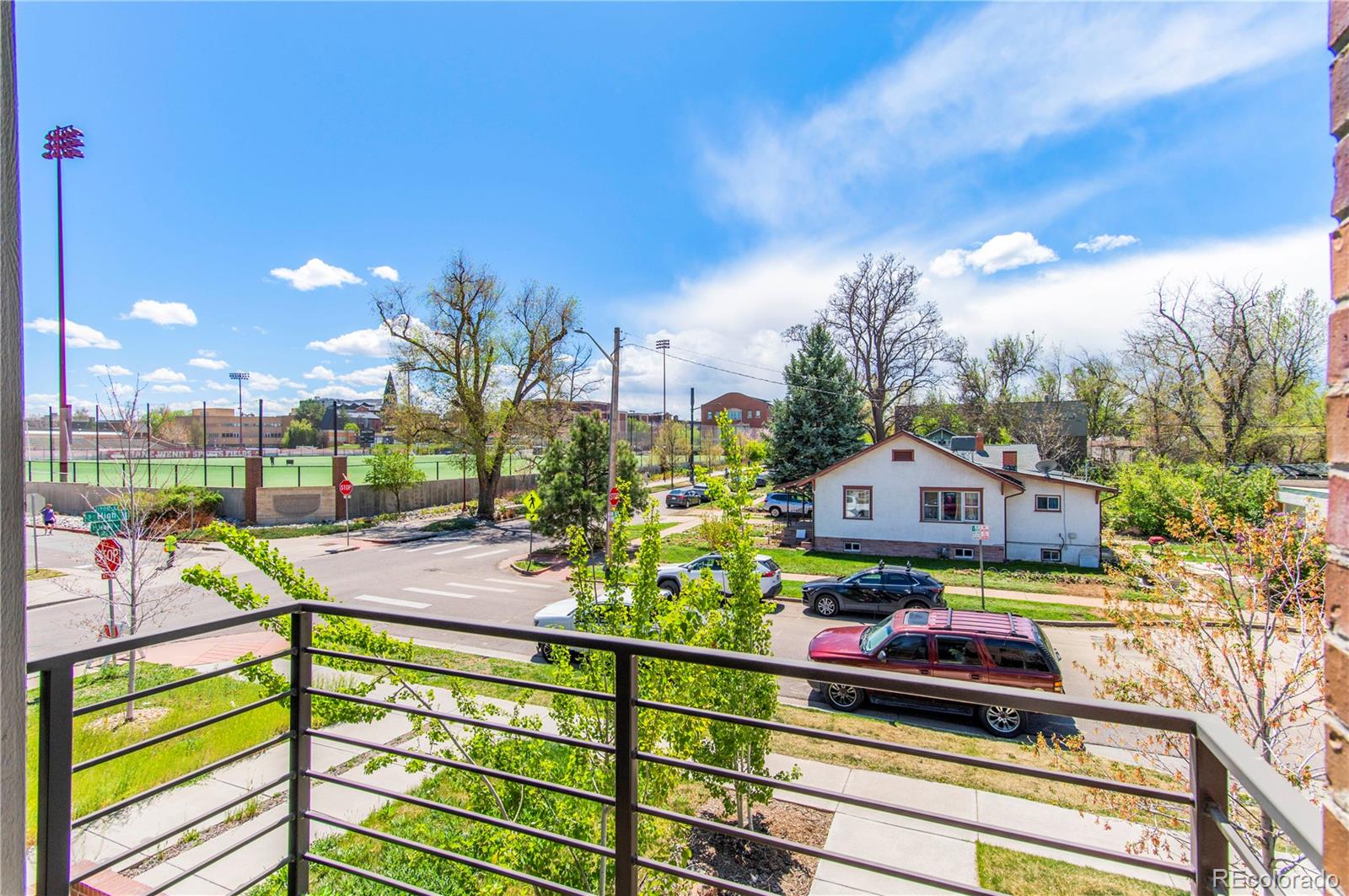1833 East Jewell Avenue Denver, CO 80210 - Photo 24 of 41 a view of a swimming pool with a lounge chairs