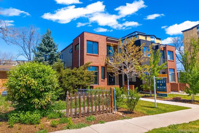 a front view of a house with yard