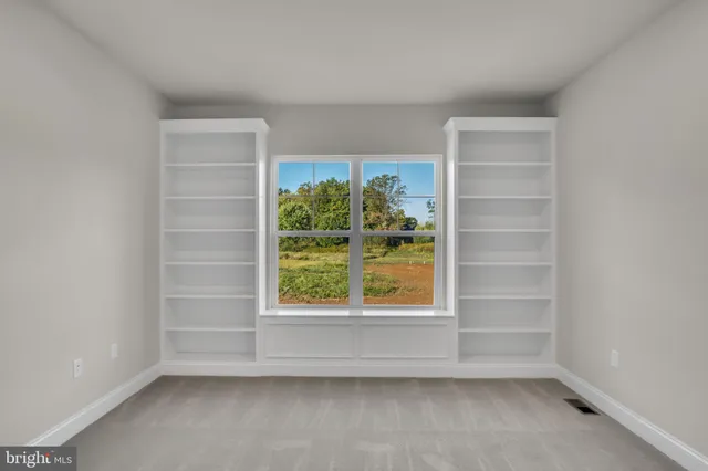 an empty room with a window