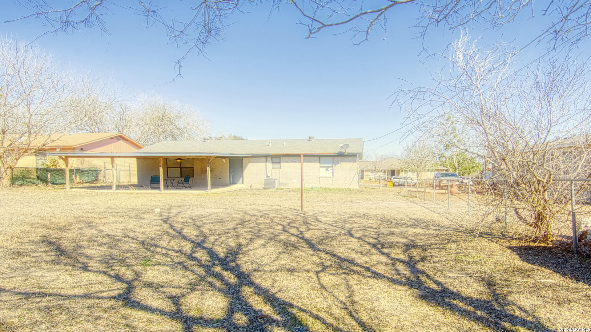 406 Pine Street Kenedy, TX 78119 - Photo 14 of 31 a view of an house with backyard space and balcony