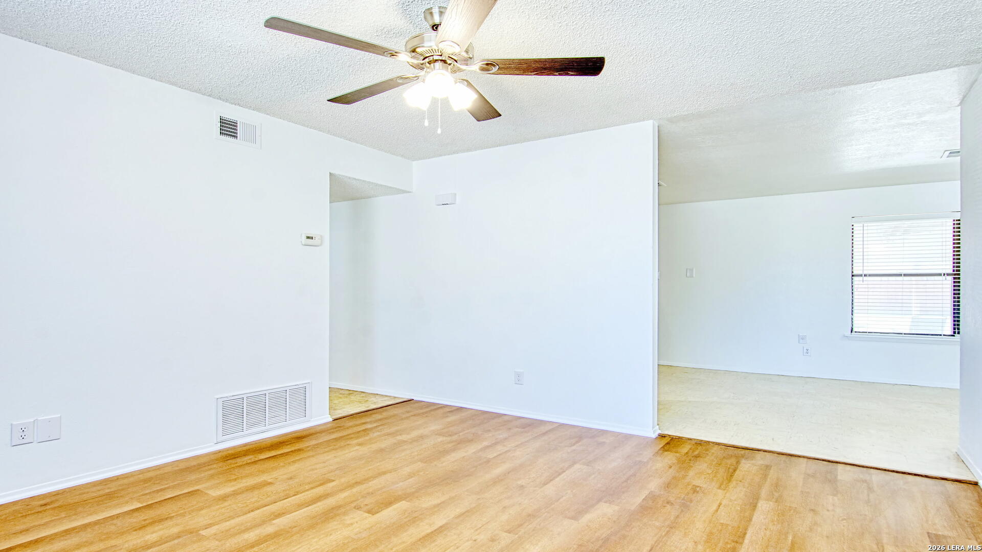 406 Pine Street Kenedy, TX 78119 - Photo 20 of 31 a view of empty room with wooden floor