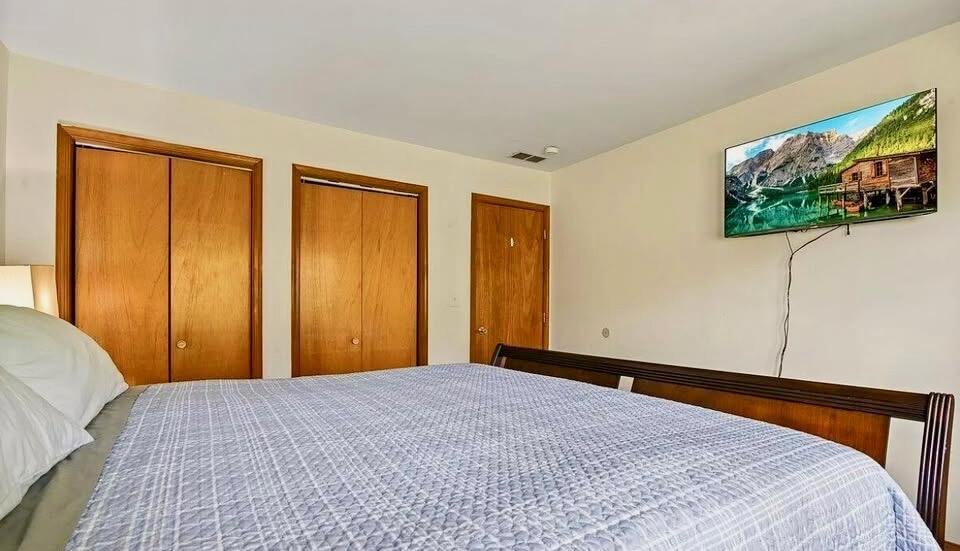 266 Image Drive Scotrun, PA 18355 - Photo 9 of 23 a bedroom with a large bed and a window