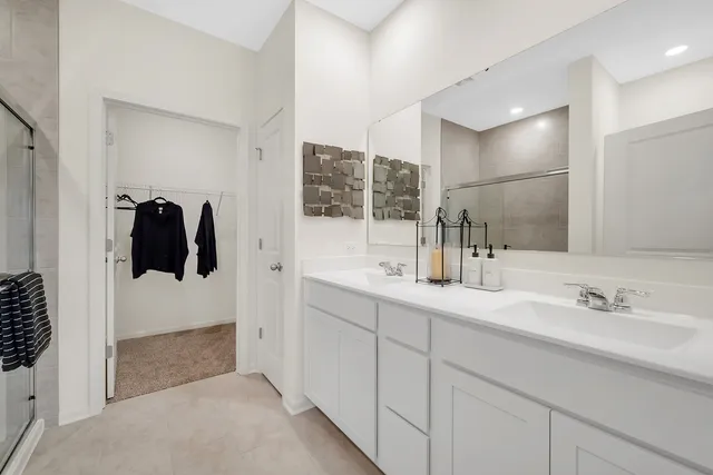 a bathroom with a sink and mirror