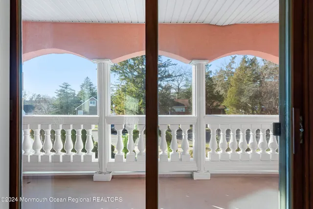 a view of a porch with a door