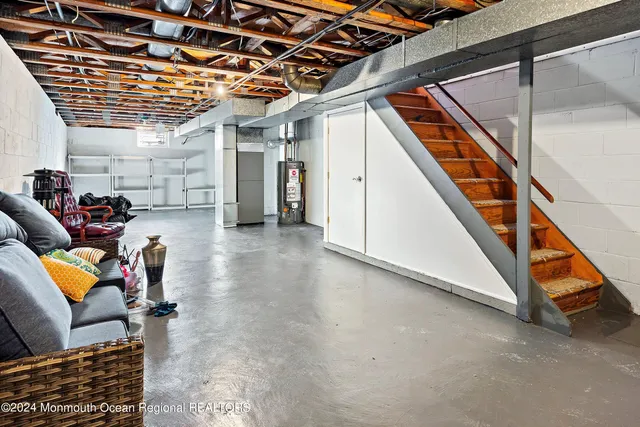 a storage room with furniture and stairs