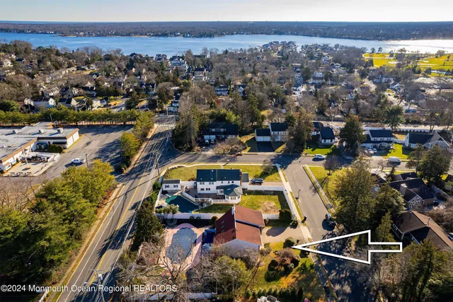 an aerial view of a houses with outdoor space