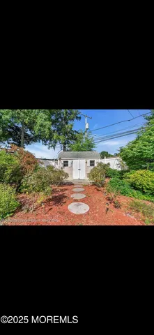 a view of ocean from a yard