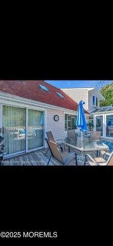 a view of house with swimming pool and outdoor space