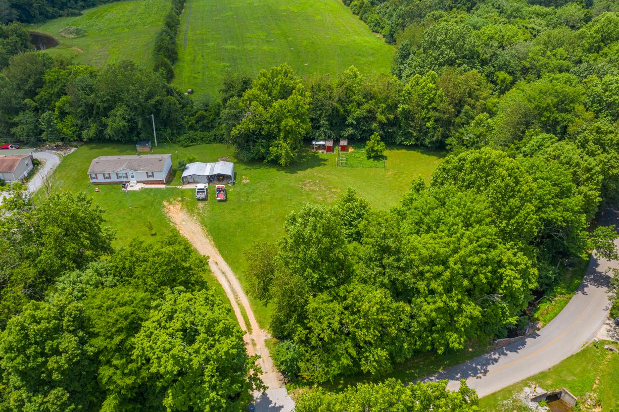 262 Dorris Road Portland, TN 37148 - Photo 2 of 29 an aerial view of a house with a yard