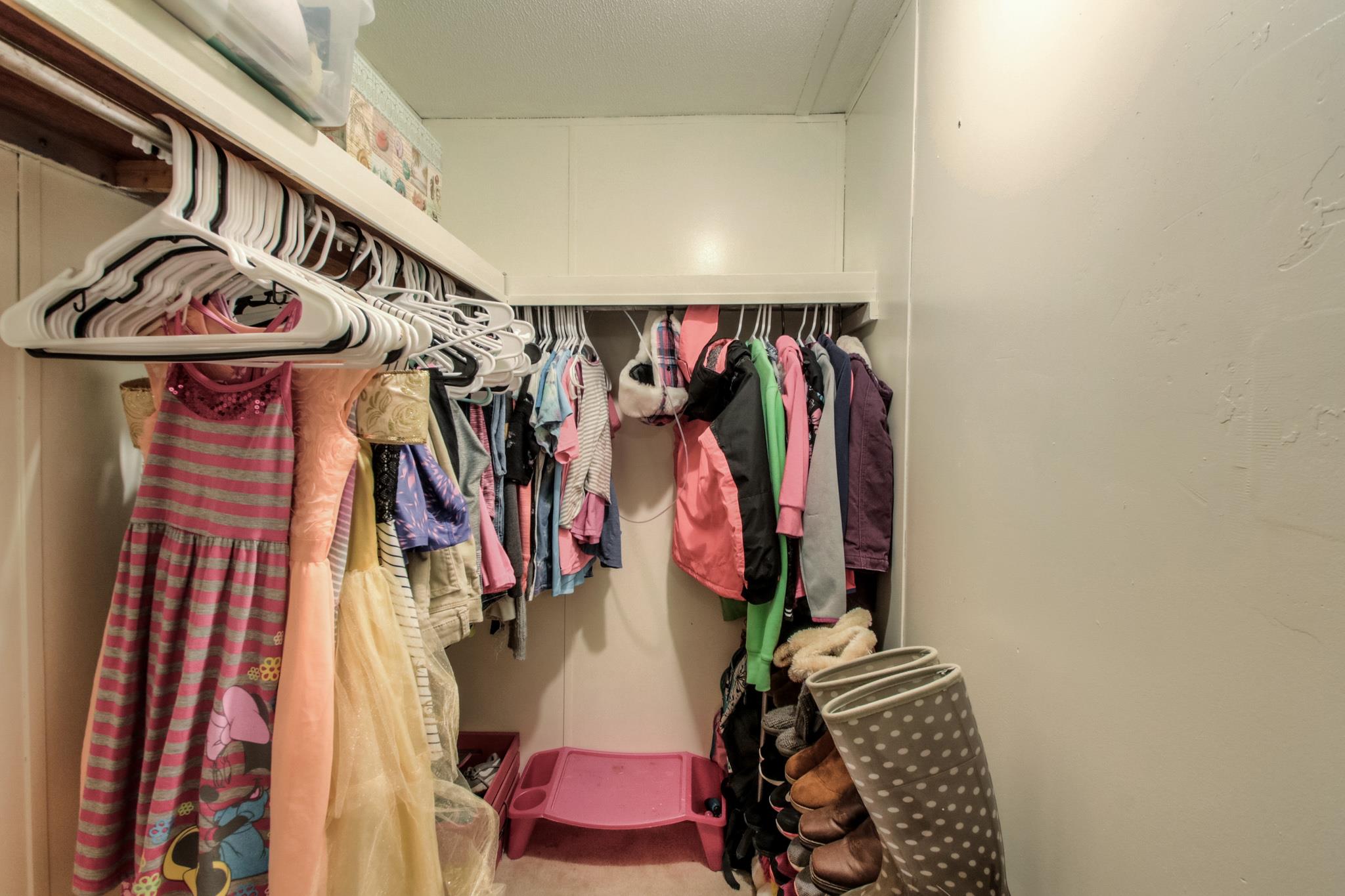 262 Dorris Road Portland, TN 37148 - Photo 21 of 29 a view of walk in closet with clothes