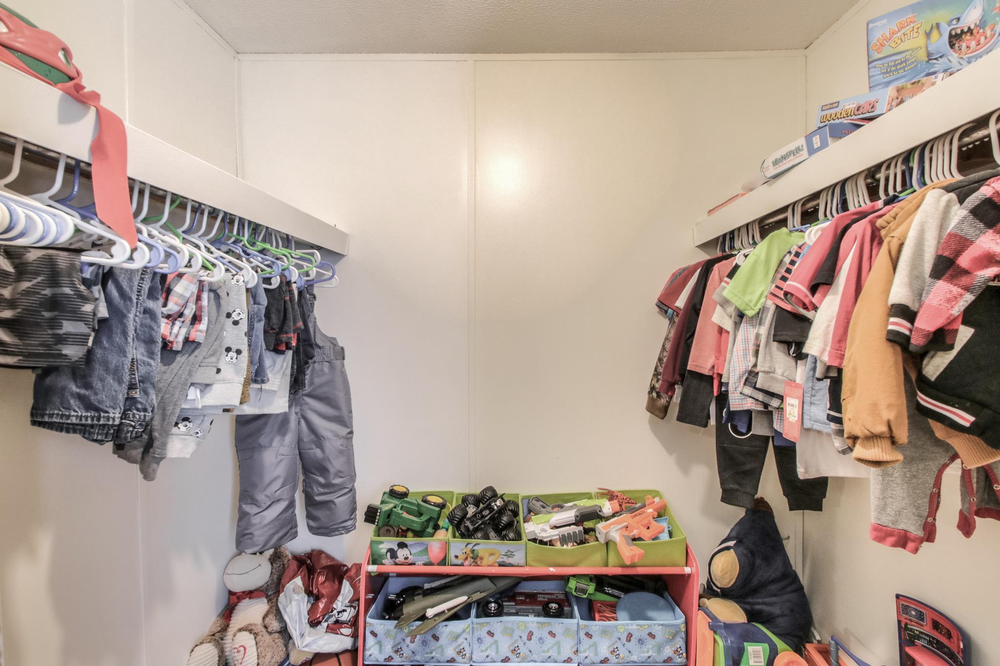 262 Dorris Road Portland, TN 37148 - Photo 27 of 29 a view of walk in closet with clothes and shoes