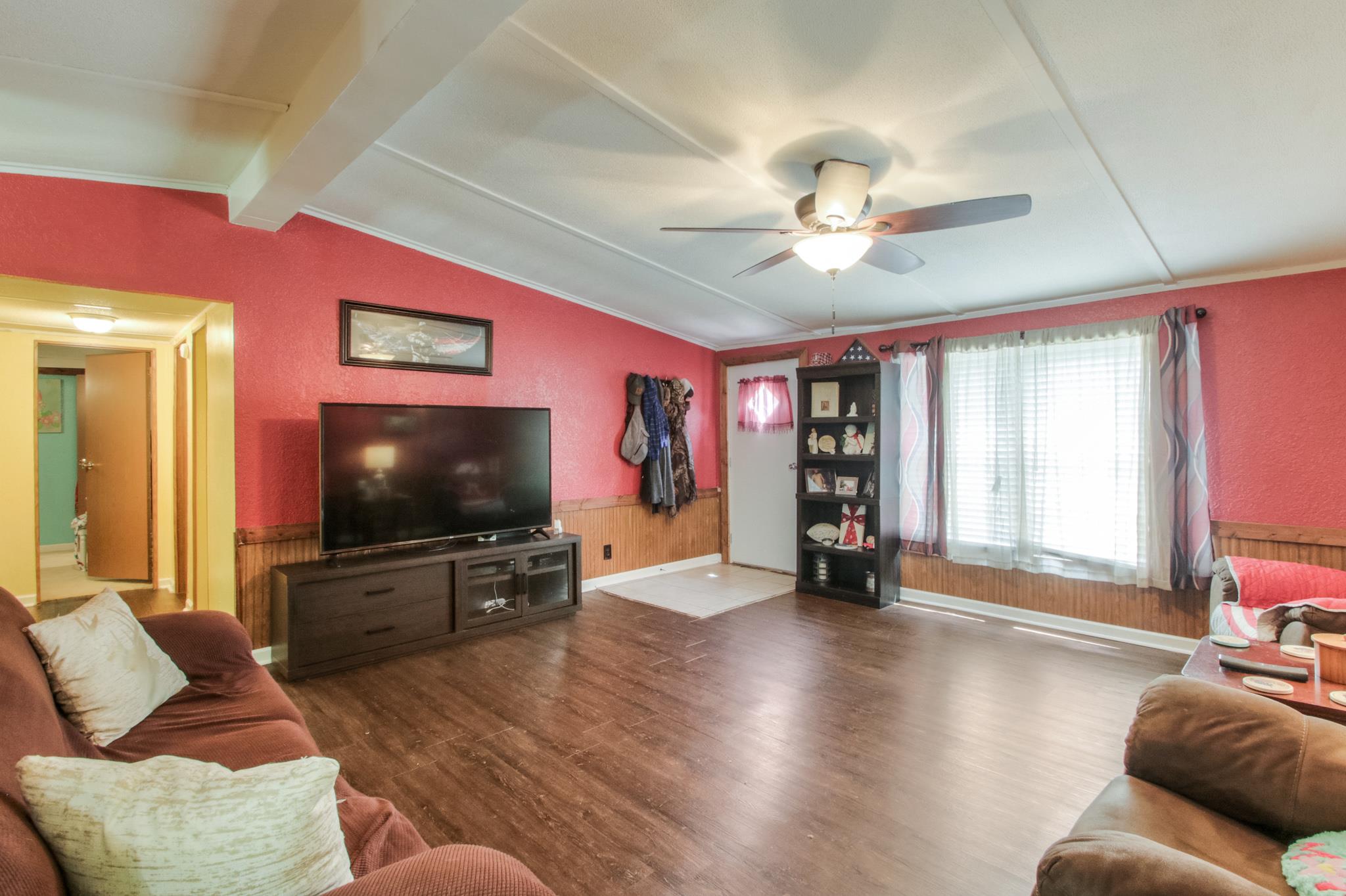 262 Dorris Road Portland, TN 37148 - Photo 3 of 29 a living room with furniture and a flat screen tv