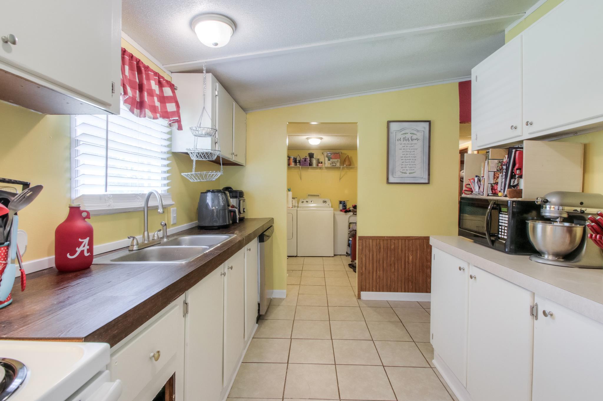 262 Dorris Road Portland, TN 37148 - Photo 6 of 29 a kitchen with stainless steel appliances a sink and cabinets