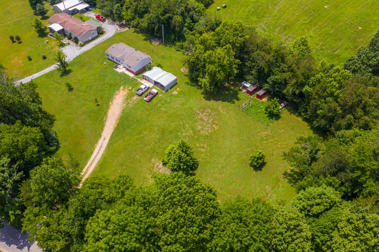 262 Dorris Road Portland, TN 37148 - Photo 7 of 29 an aerial view of a residential houses with swimming pool