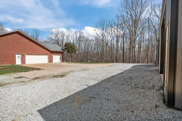 $795,000 | 662 Oak Shadow Drive, New Johnsonville, TN 37134