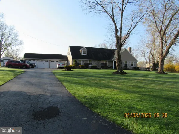 a view of a park with of a house