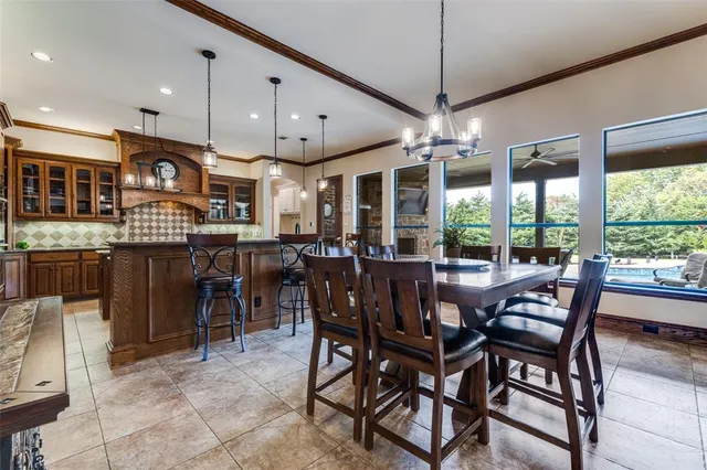 a view of a dining area with furniture window and outside view