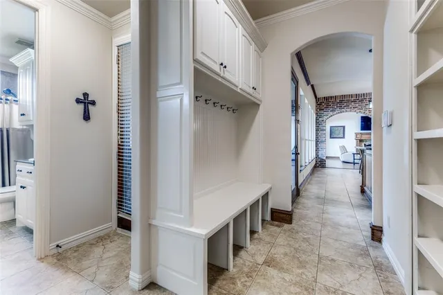 a view of a hallway with staircase