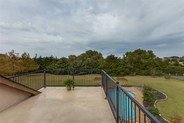a view of a balcony with ocean view