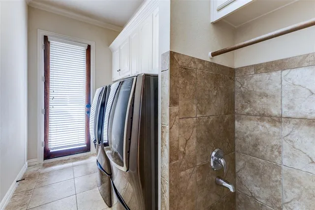 a view of a house with swimming pool and yard