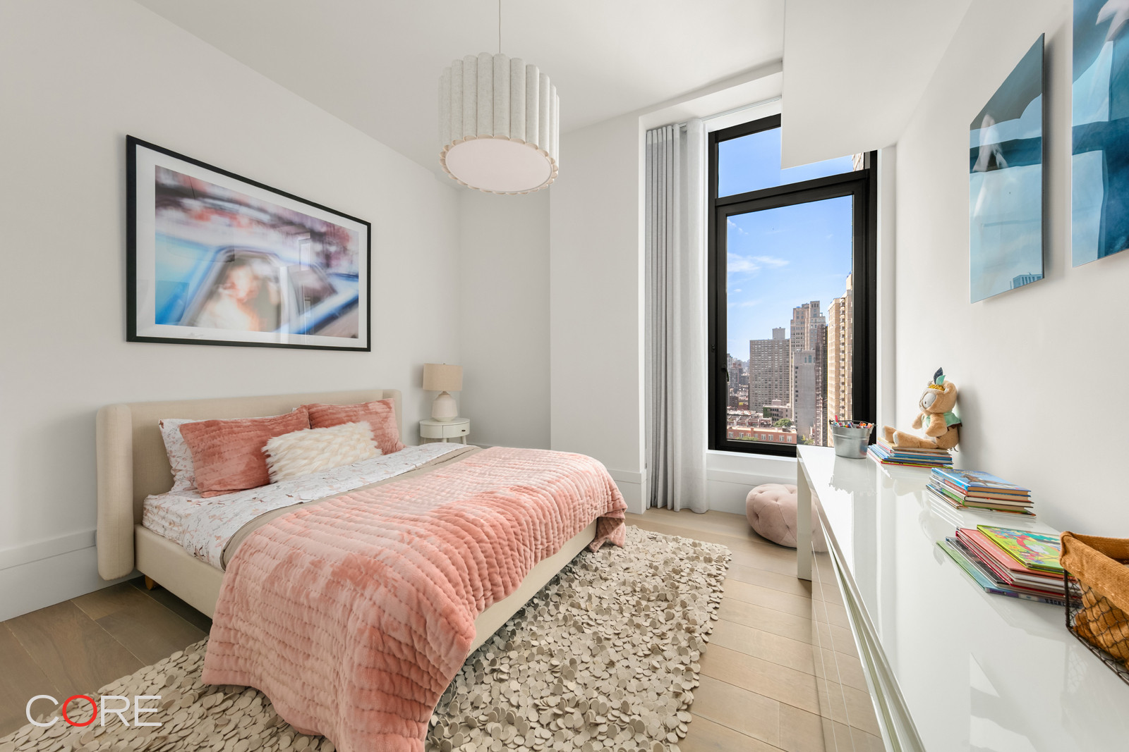 Undisclosed Address Manhattan, NY 10028 - Photo 10 of 22 a bedroom with a bed and a large mirror on a dresser